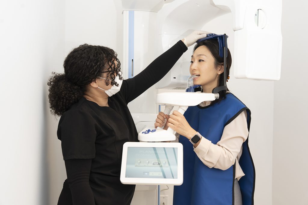 Dental Nurse Taking X-Rays
