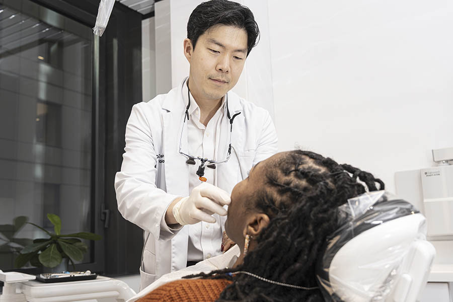 Comfortable denture repair treatment experience for patient at Midtown Manhattan dental office NYC