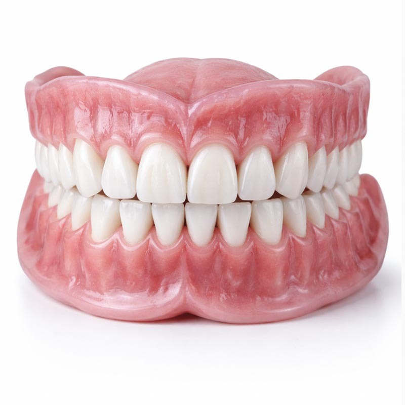 full set of natural-looking dentures showing upper and lower teeth replacement in Midtown Manhattan NYC