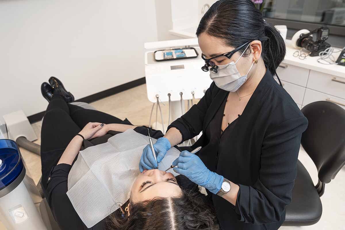Tooth sensitivity evaluation by dentist at NYC Dentistry Center in Midtown East Manhattan near East 45th Street between 5th Avenue and Madison Avenue